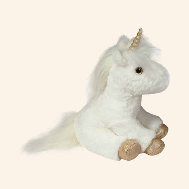 Douglas Toys Elodie White Unicorn Soft Plush shown from a side angle, highlighting the white plush body, long fluffy mane and tail, gold horn, and shimmery golden hooves.