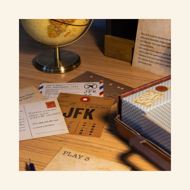 Fizz Creations Solve the Case gameplay scene showing puzzle cards, notes, clues, and case materials spread across a desk with a globe and mystery props nearby.