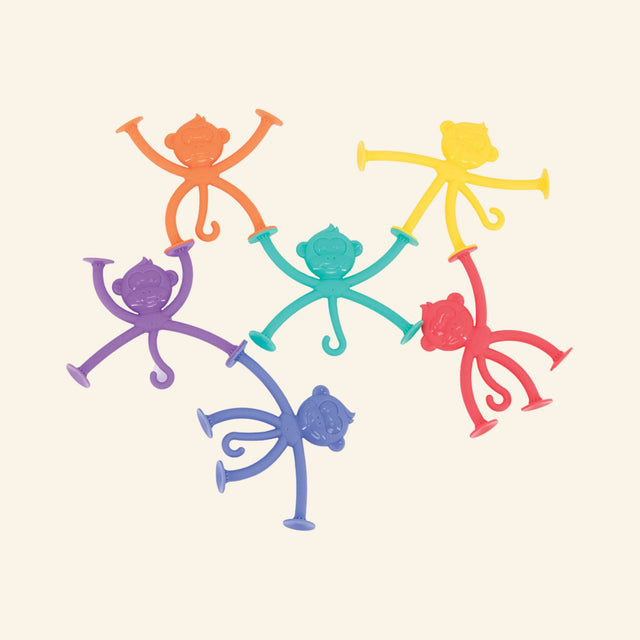 HangaTangs silicone monkeys linked together using suction cup hands and feet for creative sensory play.