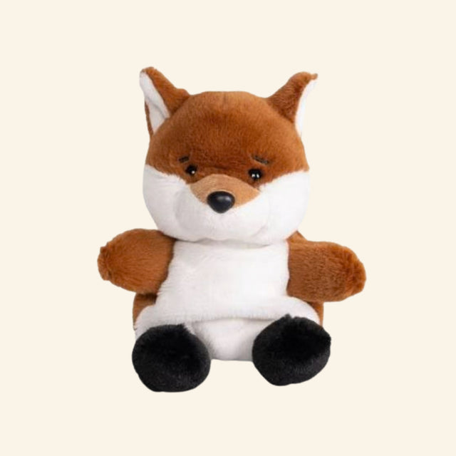 Keycraft Living Nature Little Snugglies Woodland fox plush shown seated with reddish-brown fur, white face and belly, black paws, pointed ears, and a soft rounded body.