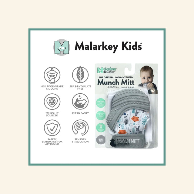 Malarkey Kids Munch Mitt shown with the included white travel bag, gray teething mitten, adjustable strap, and Malarkey Kids logo on the drawstring pouch.