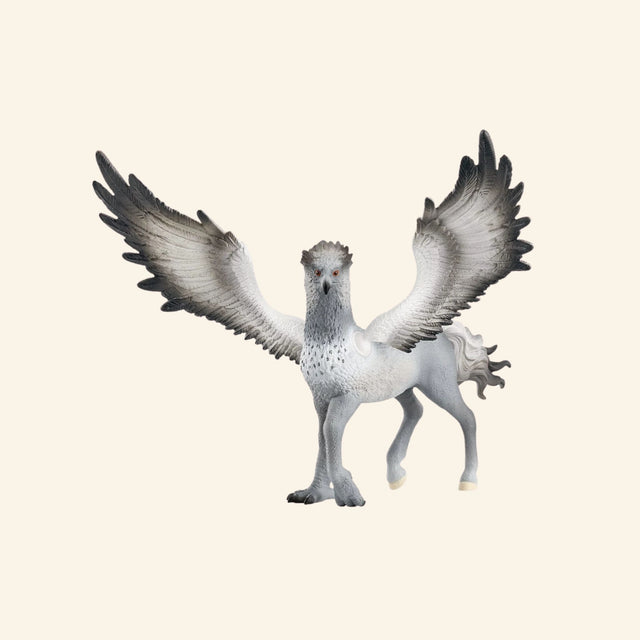 Schleich® Buckbeak™ hippogriff figure shown with wide grey-black wings, feathered head, sharp talons, horse-like body, powerful hooves, and detailed fantasy creature sculpting.