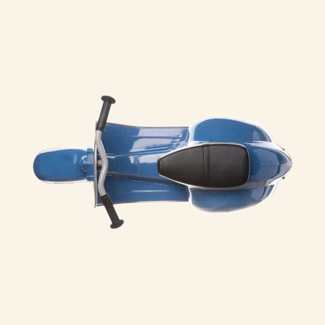 Top view of the AMBOSSTOYS PRIMO ride-on toy scooter in blue showing the black seat and handlebar layout.