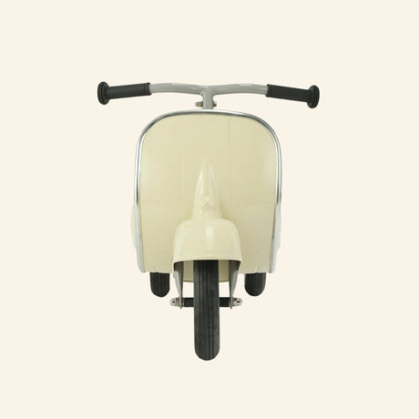 Front view of the cream AMBOSSTOYS PRIMO ride-on toy scooter with a brown seat.