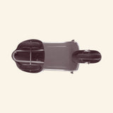 Underside view of the AMBOSSTOYS PRIMO ride-on toy scooter showing the wheel placement, metal body construction, and base details.