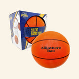 Anywhere Sports Silent Basketball 9.5" shown with orange foam basketball labeled The Anywhere Ball and blue retail box marked Silent Basketball.
