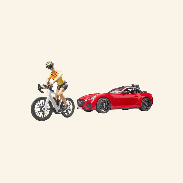 Bruder Red Roadster with Road Bike and Cyclist set showing a red convertible roadster beside a cyclist figure riding a white road bike.