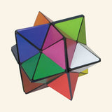 California Creations The Amazing Starcube transformed into a colorful 12-point star shape made from triangular panels in blue, green, pink, orange, white, yellow, and black.