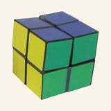 alifornia Creations The Amazing Starcube folded into a compact cube with green, yellow, blue, and purple square panels separated by black hinge lines.