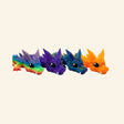 Classic Crystal Dragon assortment shown in multiple bright crystal colorways with fully articulated bodies, faceted texture, dragon heads, horns, and glossy eyes.
