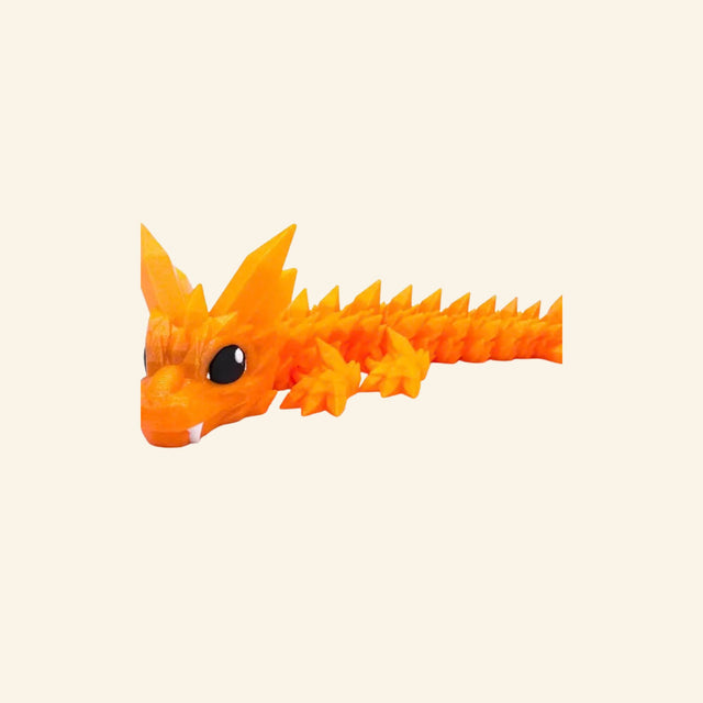 Orange Classic Crystal Dragon shown from the side with faceted crystalline texture, articulated body, pointed horns, spiked back, and glossy black eye.