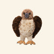 Douglas Orion Red-Tailed Hawk plush featuring soft feather-textured brown and cream fur, a reddish tail, amber eyes, gray beak, and realistic talons.