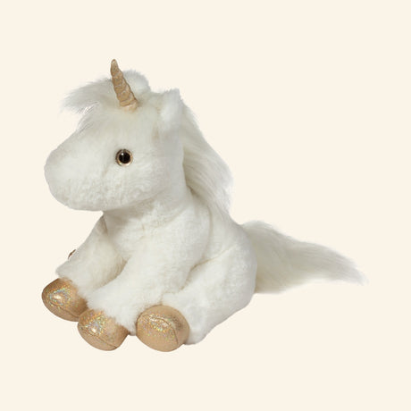 Douglas Toys Elodie White Unicorn Soft Plush shown seated at an angle with soft white fur, gold horn, long mane, fluffy tail, and shimmery golden hooves.