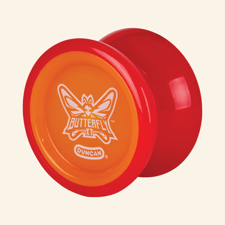 Duncan Butterfly XT Yo-Yo shown unboxed in orange and red, highlighting the wide butterfly shape, rounded profile, and white Butterfly XT logo on the orange center.