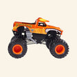 Monster Jam El Toro Loco Rev ’N Roar monster truck shown from the side, featuring an orange bull-themed body with flame graphics, horns, oversized black BKT tires, orange wheel hubs, and exposed suspension.