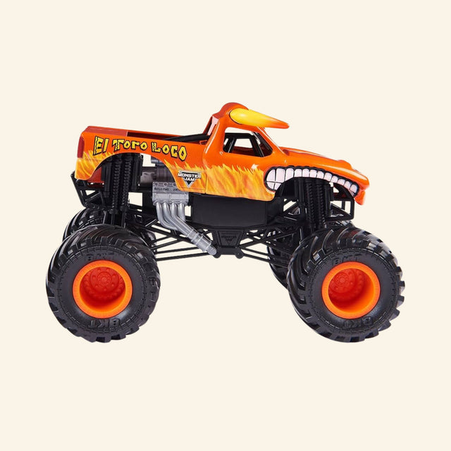 Monster Jam El Toro Loco Rev ’N Roar monster truck shown from the side, featuring an orange bull-themed body with flame graphics, horns, oversized black BKT tires, orange wheel hubs, and exposed suspension.