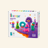 Fat Brain Toys Hey Clay – Monsters retail box showing colorful monster clay characters, Hey Clay branding, bright clay colors, and app-guided sculpting details.
