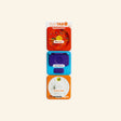 Brain Toys PlayTab Set of Three Tiles – Set #3 shown as a vertical set of three magnetic activity tiles, including an orange sensory tile, purple switch-style tile, and white pattern activity tile.