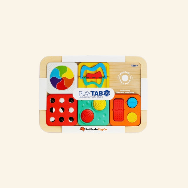 Fat Brain Toys PlayTab Modular Activity Board shown with colorful compatible activity tiles attached, including sensory buttons, a color wheel, gear-style pieces, sliders, and maze-style play features.