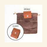 Find New Roots Foraging Bag shown in both open and closed positions, with the open brown waxed-canvas pouch expanded and the compact folded pouch shown beside it.