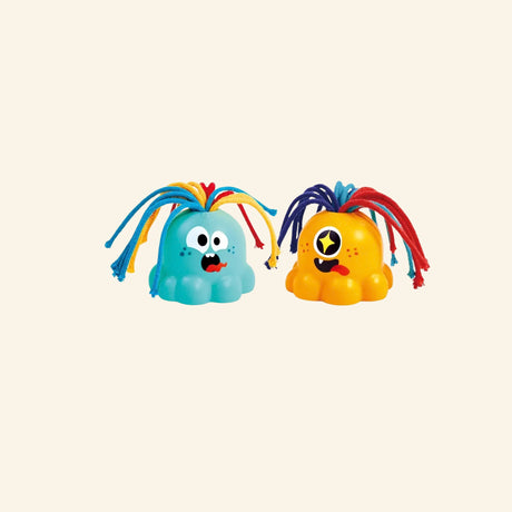 Hape Noisy Alien toys shown out of the box in teal and orange with soft rounded bodies, big expressive eyes, and colorful pullable rope hair.