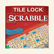 Hasbro Tile Lock Scrabble retail box front showing the red Scrabble packaging, tile-lock gameboard artwork, letter tiles, and callout that the board keeps tiles in place.
