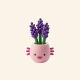 Hey Clay salvia plant character sculpture with purple flowers in a smiling pink flower pot.