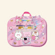 Hot Focus Comfy Lap Desk – Critters shown in packaging with a pastel pink cushioned lap desk covered in cute bunny, bear, cat, candy, cherry, heart, and ice cream artwork, plus visible gel pen and erasable color pencil accessories.