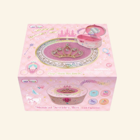 Hot Focus Musical Jewelry Box with Figurine – Princess shown in pink retail packaging with crown artwork, princess-themed graphics, open jewelry box illustration, mirror, dancing figurine, and age 5+ guidance.