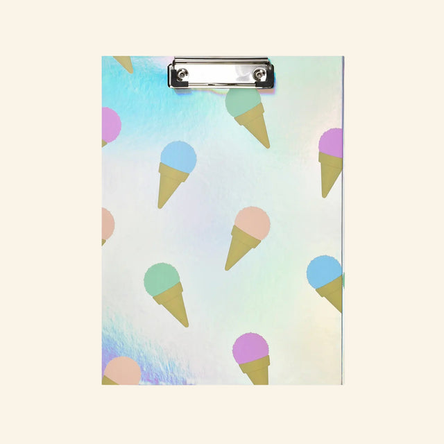 iScream Sweet Scoops Holographic Clipboard Set shown closed from the front, featuring a shiny pastel holographic clipboard with scattered ice cream cone artwork and a silver metal clip at the top.