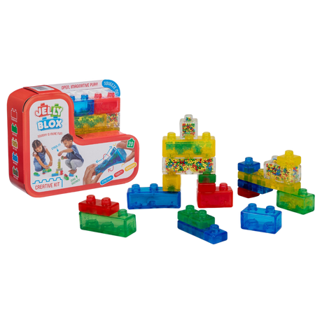 Colorful building blocks set with packaging on a white background