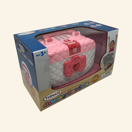 Kids Jewelry Box Safe in retail packaging featuring a pink electronic safe with secret code lock, fingerprint release, and carrying handle.
