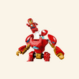 Close-up of the LEGO® Marvel Iron Man mech from the Ultron vs. Iron Man set, showing the red-and-gold armor, blue chest detail, movable arms, and opening cockpit area.