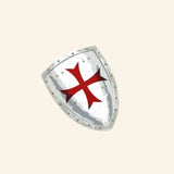 Liontouch Maltese Knight Shield shown in silver-gray EVA foam with a bold red Maltese cross, rivet-style border, and medieval armor-inspired design.