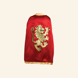 Liontouch Noble Knight Cape in red shown from the back with gold trim and a large gold lion crest for knight dress-up and pretend play.