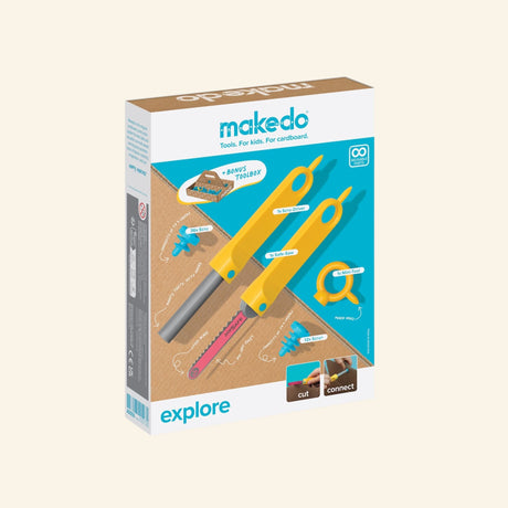 Makedo Explore retail box showing the yellow Safe-Saw, Scru-Driver, Mini-Tool, blue Scrus, and cardboard construction examples on the packaging.