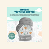 Malarkey Kids Munch Mitt sensory teething mitten graphic showing the gray woodland print mitt with textured silicone top and text describing it as a wearable teething toy for infants.