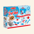 Melissa & Doug Examine & Treat Pet Vet Play Set in retail packaging showing a plush dog wearing a cone, plush gray cat, blue tote bag, stethoscope, bottles, bandages, medical tools, and treatment checklist.