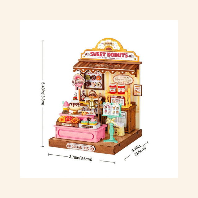 Rolife Sweetie’s Donut Shop dimensions image showing the completed pastel miniature donut shop with height, width, and depth measurements.