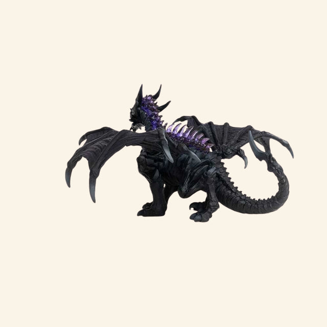 Schleich® ELDRADOR® Creatures Shadow Dragon shown in a dynamic pose with open wings, curved claws, spiked head, and dark purple-and-black coloring.