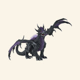 Schleich® ELDRADOR® Creatures Shadow Dragon shown from the side with raised wings, black body, purple chest, spiked back, and long dragon tail.