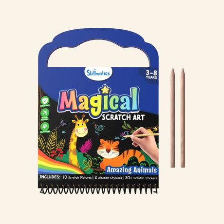 Skillmatics Magical Scratch Art – Animals spiral-bound activity kit with handle, showing a black scratch-art animal scene, colorful revealed designs, two wooden styluses, and age 3–8 label.