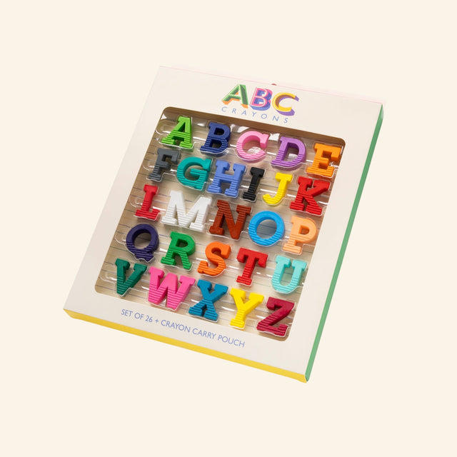 Snifty ABC Crayons set in retail packaging, showing colorful letter-shaped crayons from A to Z arranged inside the box with a printed crayon carry pouch included.