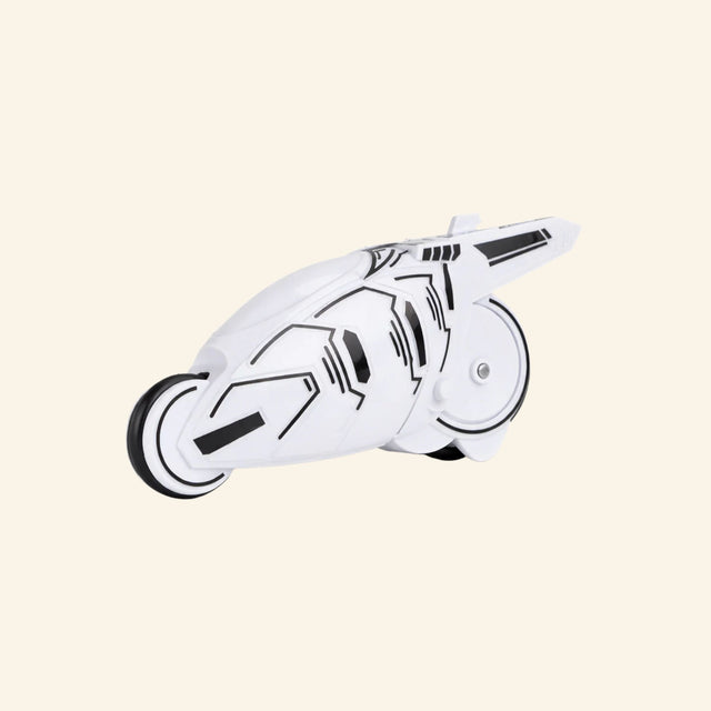 Speed Ripperz Photon Speed Cycle in white featuring a futuristic motorcycle design powered by a rip cord launcher with no batteries required.