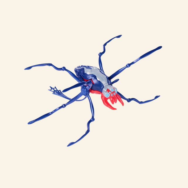 Spin Master HEX BOTS Skitter Bot Spider shown unboxed in a blue and red colorway with long spider legs, red front details, and robot insect styling.
