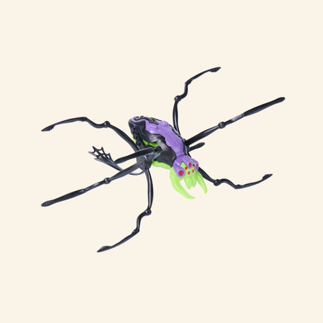 Spin Master HEX BOTS Skitter Bot Spider shown unboxed in a purple, black, and green colorway with long articulated spider legs and bright green front details.