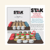 Storyastic STAK Strategy Game product graphic showing the wooden board with colorful stacked pucks, game pieces arranged for play, and text explaining the 2-to-4-player strategy concept.