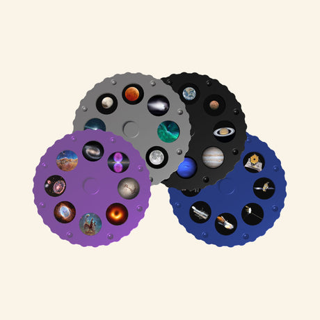 Close-up of three colorful Thames & Kosmos Planetarium Projector image disks showing small pictures of planets, spacecraft, galaxies, and other space scenes.