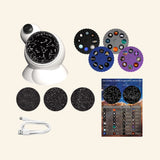 Thames & Kosmos Planetarium Projector kit contents showing the white projector, interchangeable image disks, star map domes, USB power cable, and instruction materials.