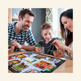 Family playing Winning Moves Clue Classic Edition at a table, holding cards while the mansion game board, dice, and game pieces are set up in front of them.
